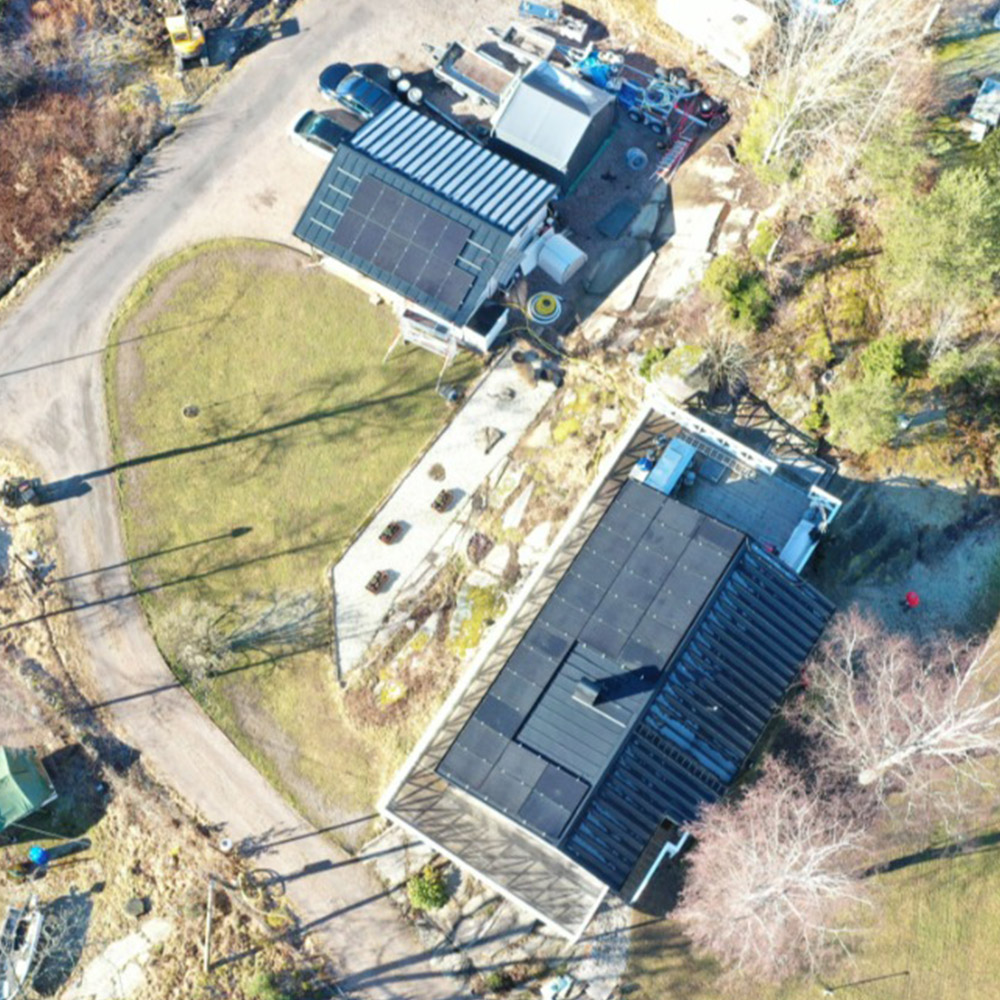 Top view of 2 houses with Bluesun Solar Panel on the roof